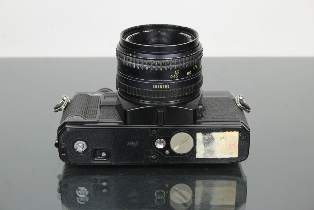 Minolta X-300 + MD Rokkor 50mm 1:1.7 55mm lens